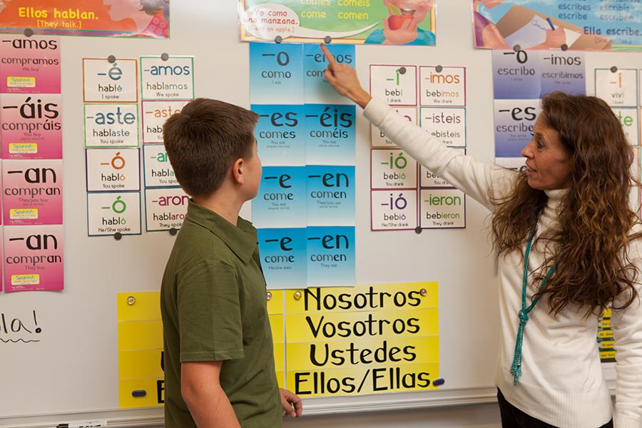 A St. Michael's student learns Spanish verb conjugations