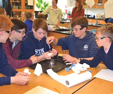 Students engaged in a classroom.