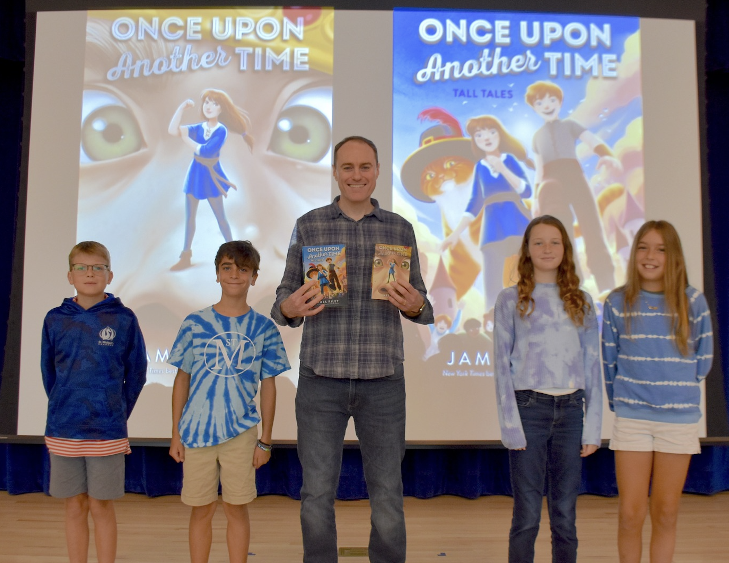 A librarian reads to Lower School students.